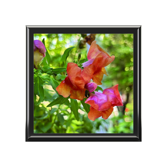 Framed photograph of pink flowers with a blurred green background
