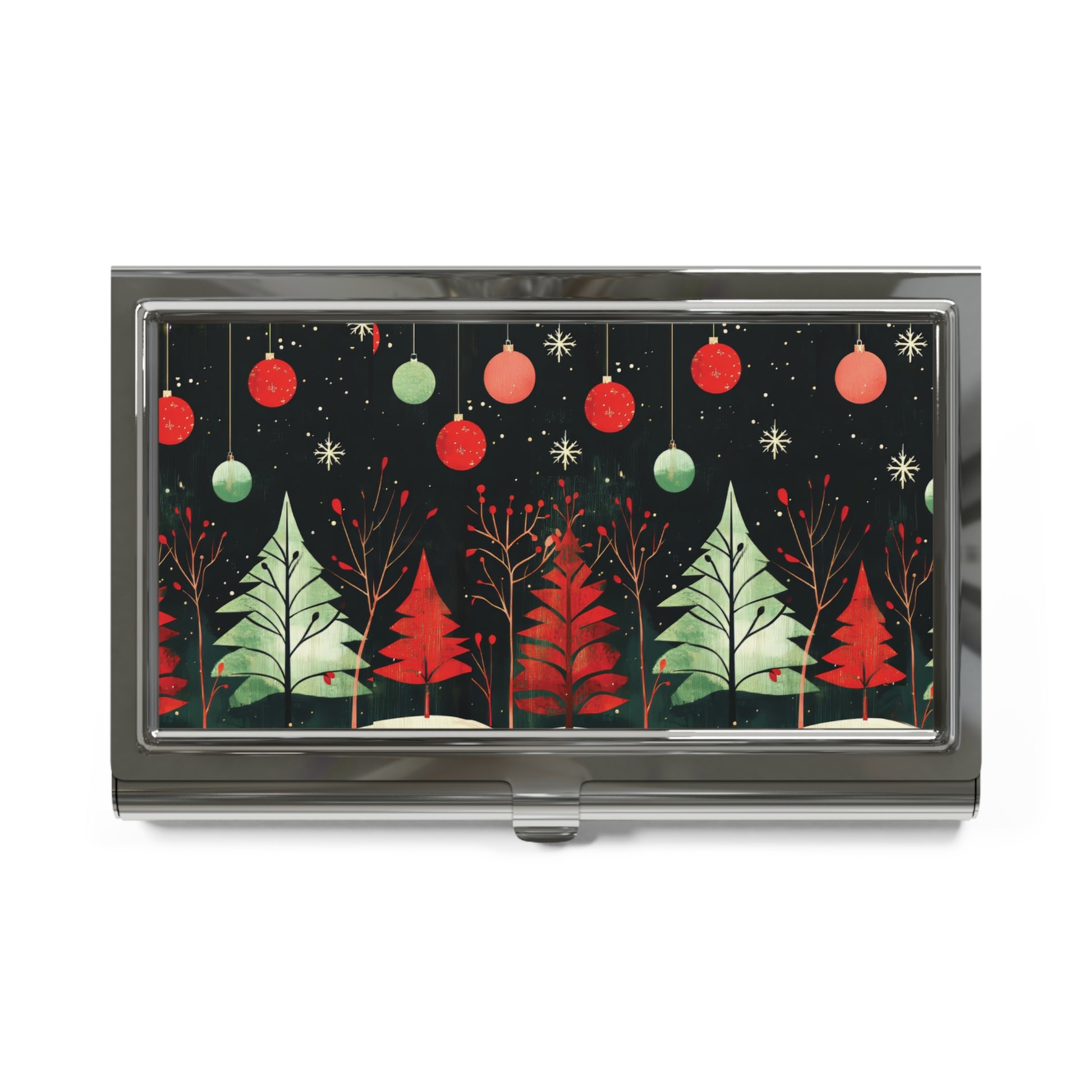 A rectangular metal case with a glossy finish, featuring a festive Christmas design on the front. The pattern shows red and green hanging ornaments, snowflake details, and stylized red and green Christmas trees on a dark background.