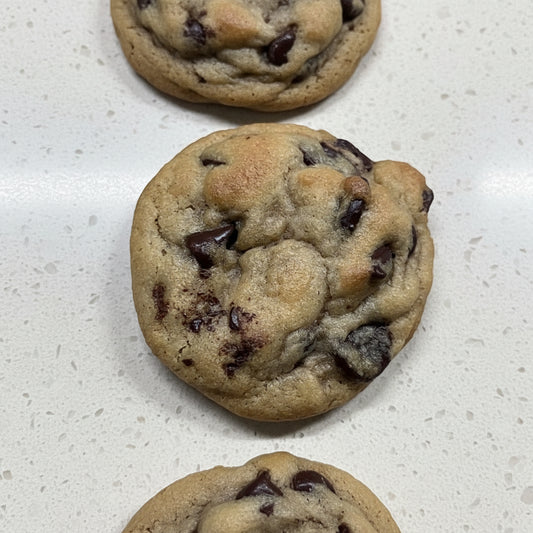 Chocolate chip cookies on a light gray surface