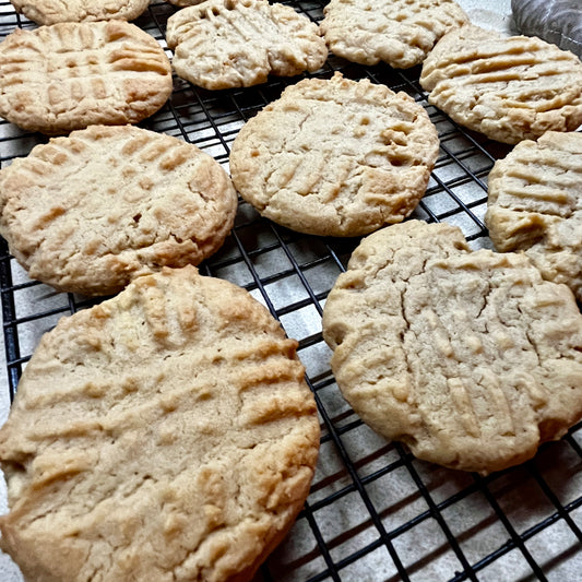 Peanut butter cookies on a cooling rack