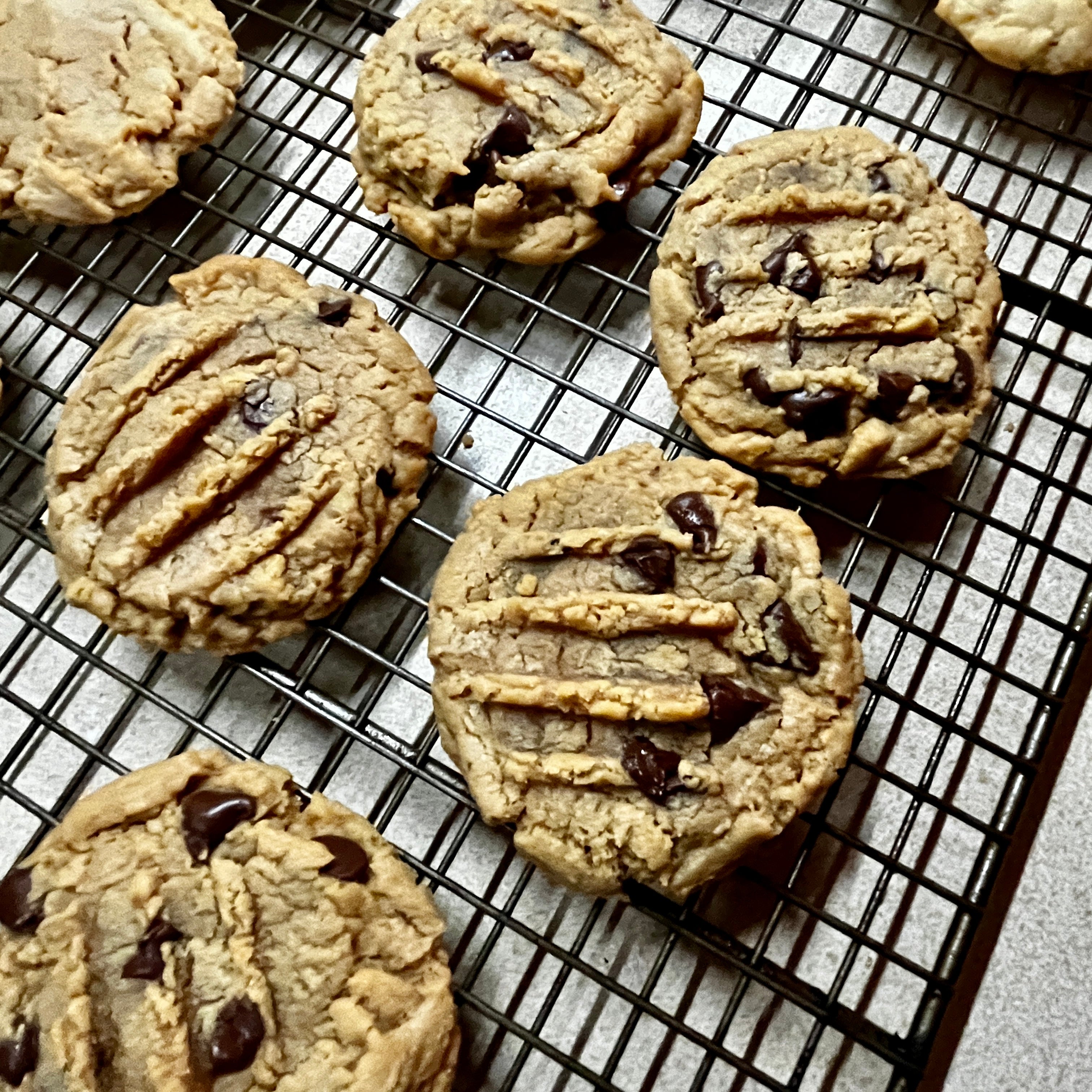 Peanut Butter Chocolate chip cookies on a cooling rack