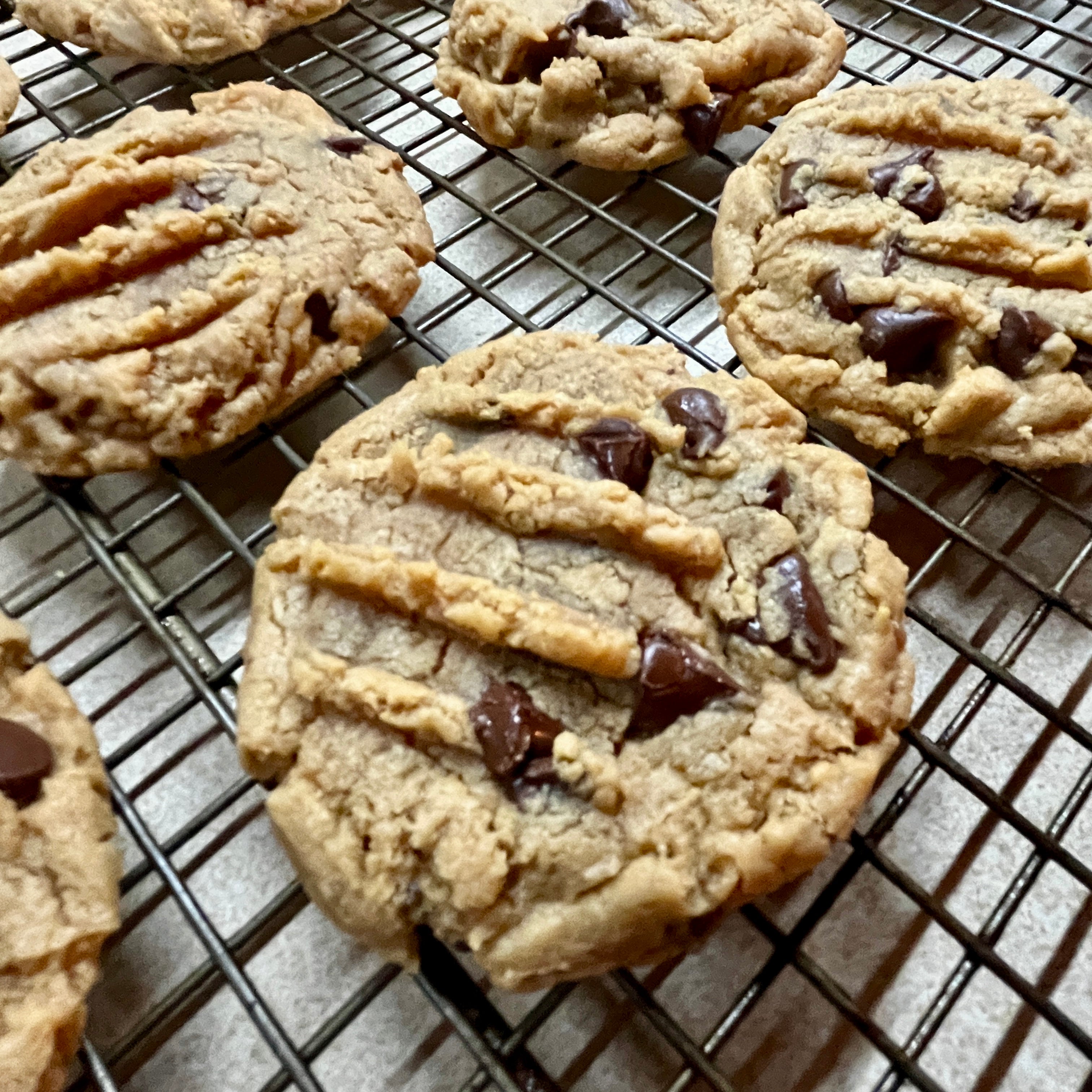 PB Chocolate chip cookies on a cooling rack