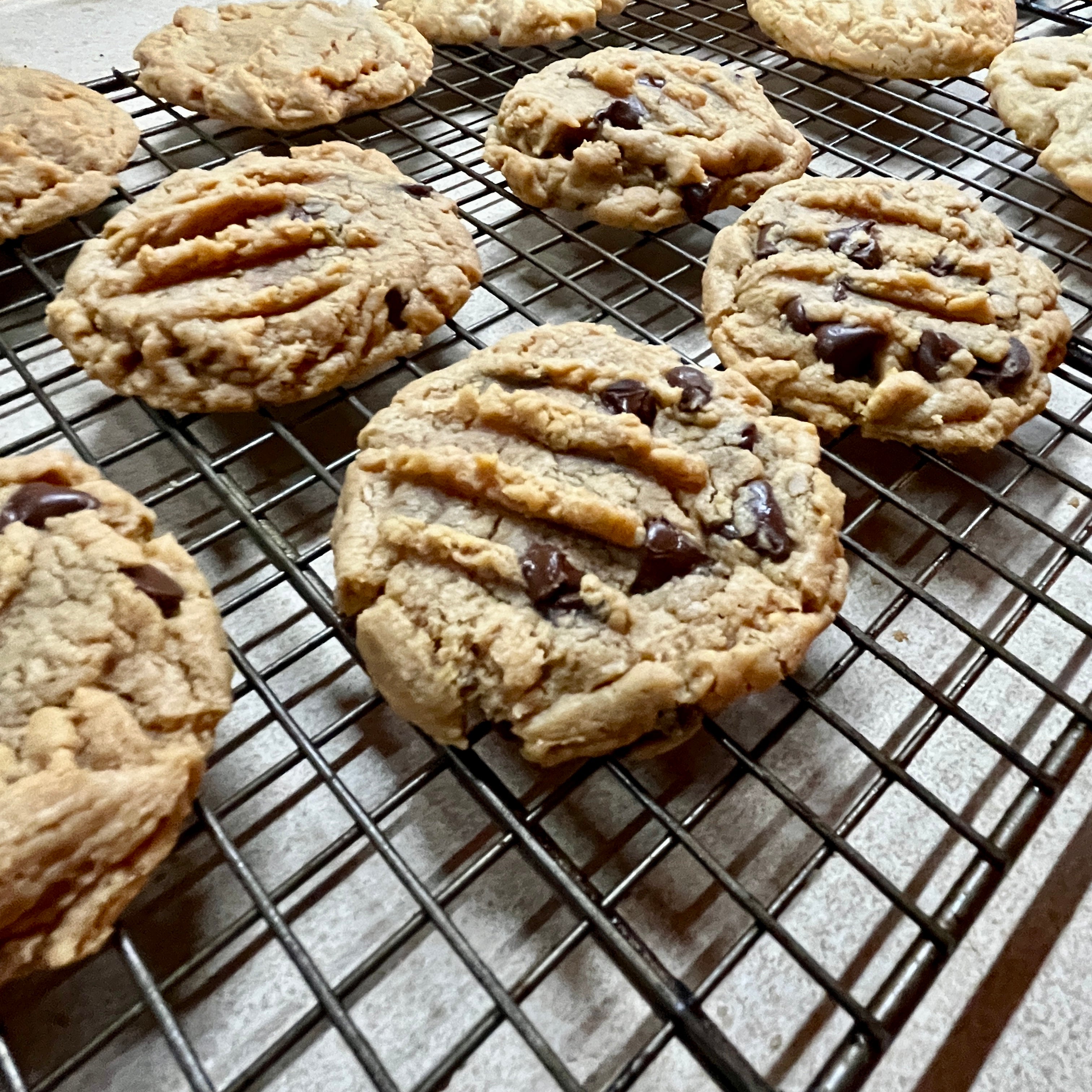 PB Chocolate chip cookies on a cooling rack