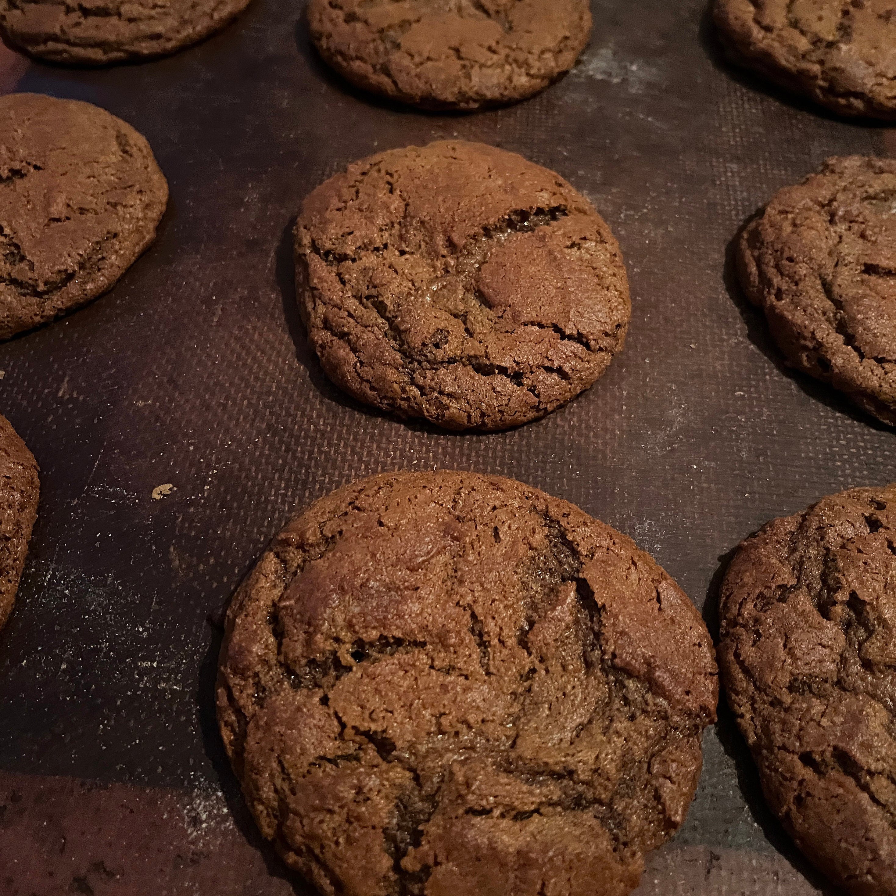Baked chocolate cookies on a baking tray