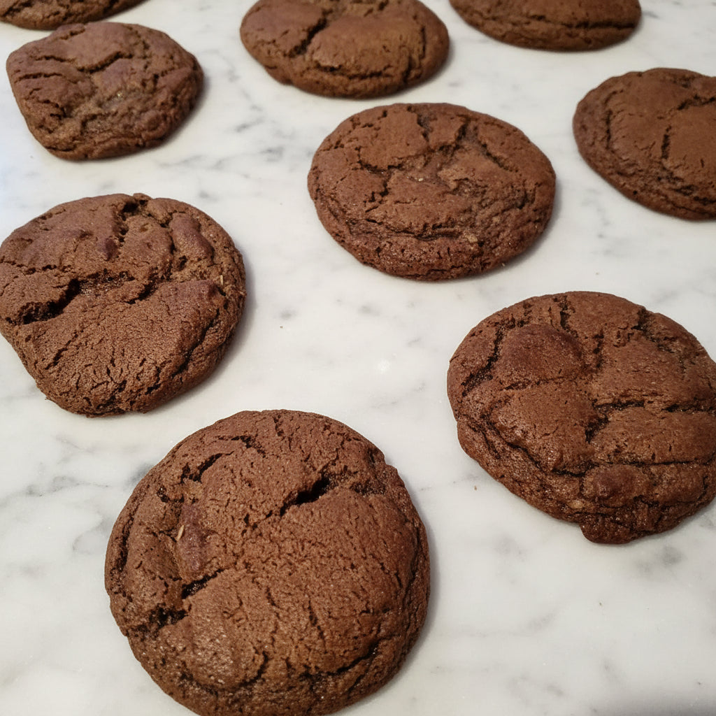 Baked chocolate cookies on a baking tray