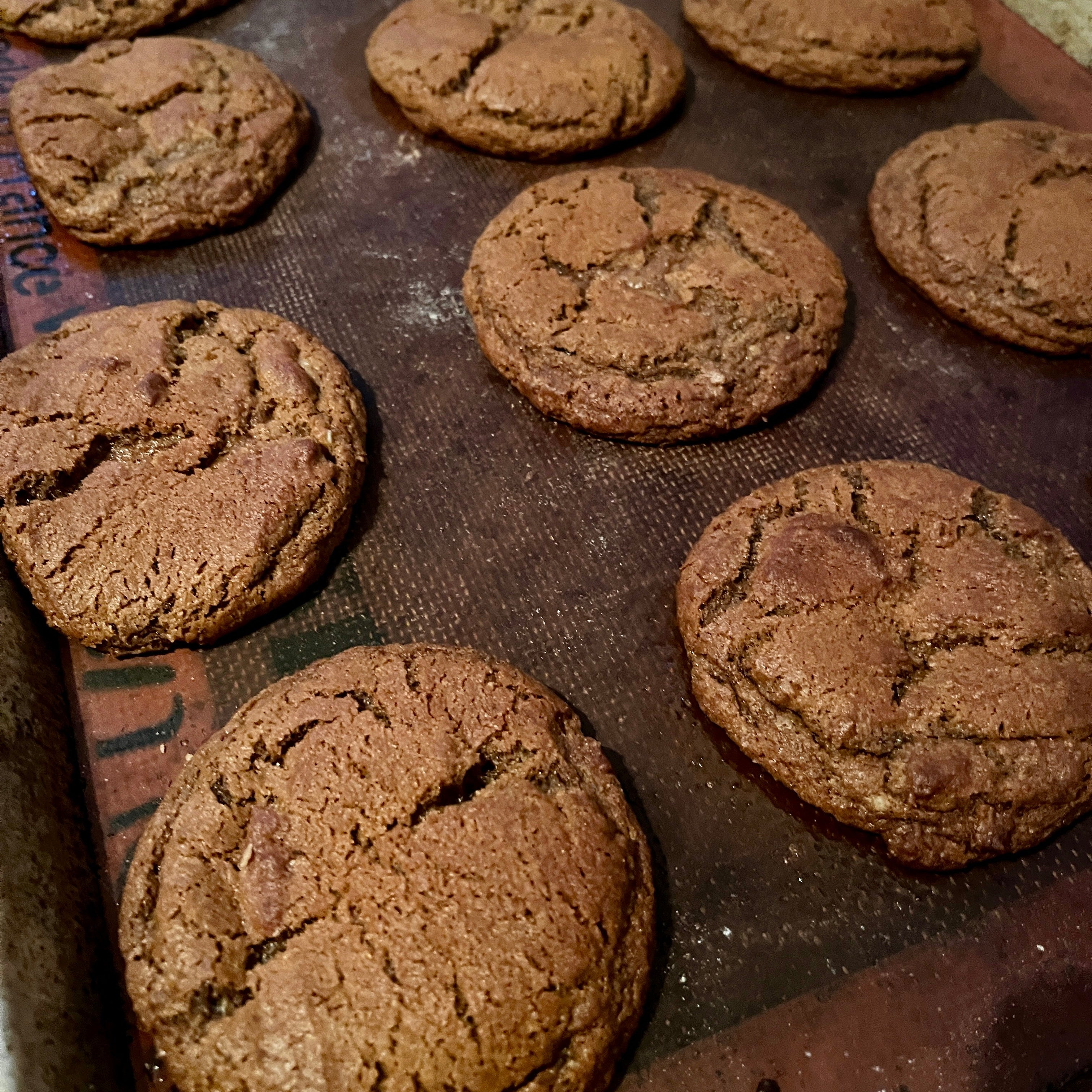 Baked chocolate cookies on a baking tray