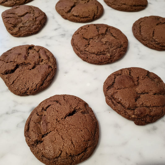 Baked chocolate cookies on a baking tray
